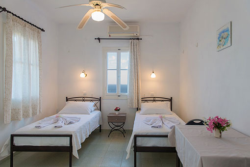 The bedroom at Roubina accommodation in Sifnos