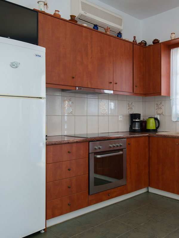 The kitchen in Roubina apartment in Chryssopigi